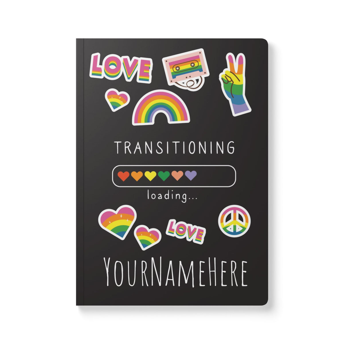 Black journal cover with colorful pride-themed stickers including a rainbow, peace sign, hearts, cassette, and love text,.