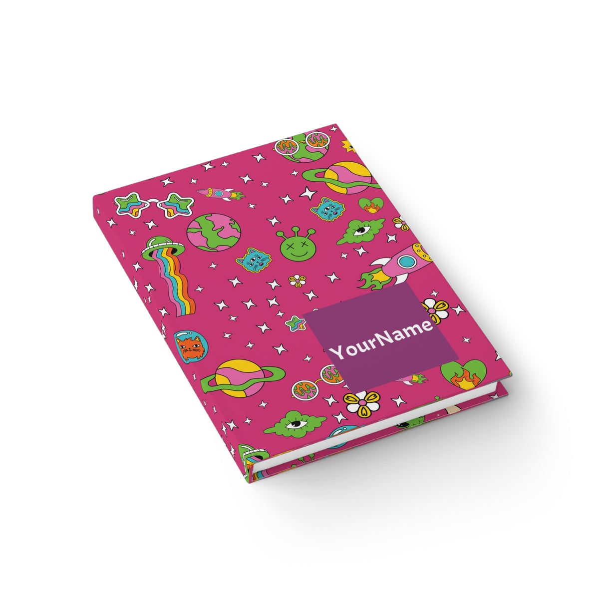 Pink journal cover with colorful alien, rainbow, planet, and star illustrations, personalized name bar.