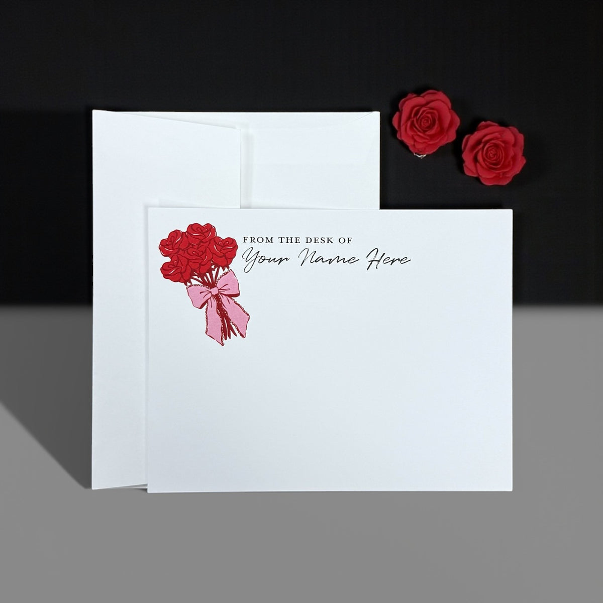 Set of personalized white stationery cards with red rose bouquet and "From the desk of Your Name Here" text.