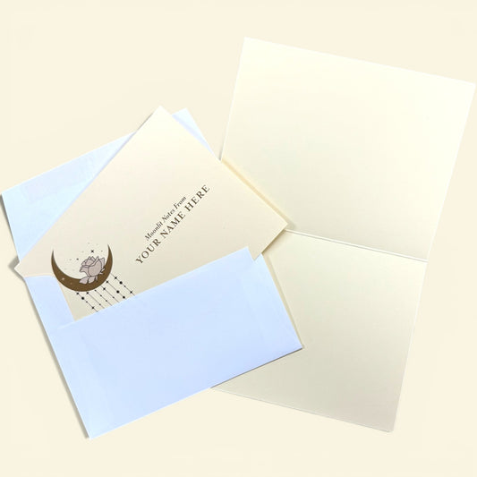 Set of 10 cream folded cards with crescent moon design and "You're Here" text, paired with pale blue envelopes and blank.