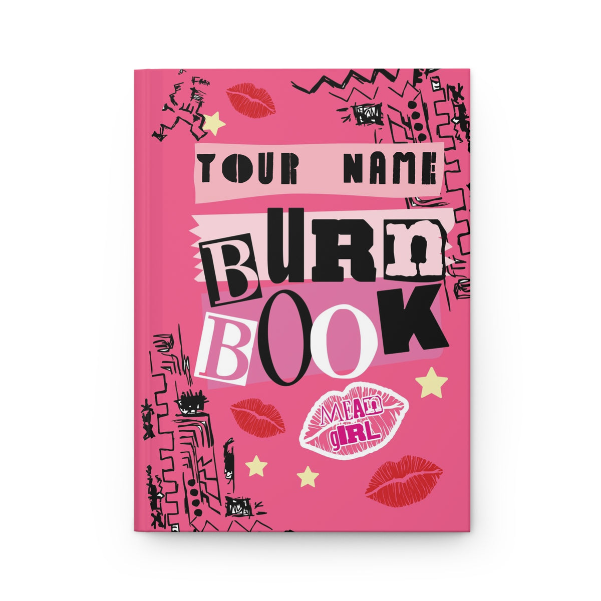 Pink hardcover journal with bold black and white "Burn Book" text, customizable name, kiss lips, stars, and doodles design.