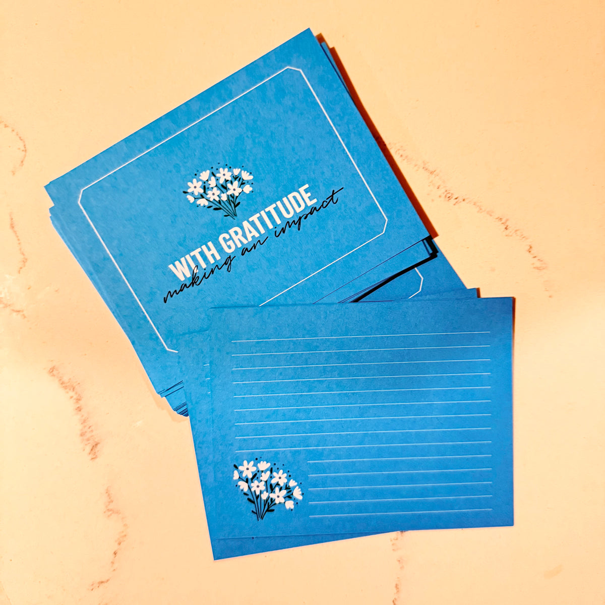 Celestial blue personalized stationery notecards with "With Gratitude" text and floral design. - With Gratitude Notecard Set