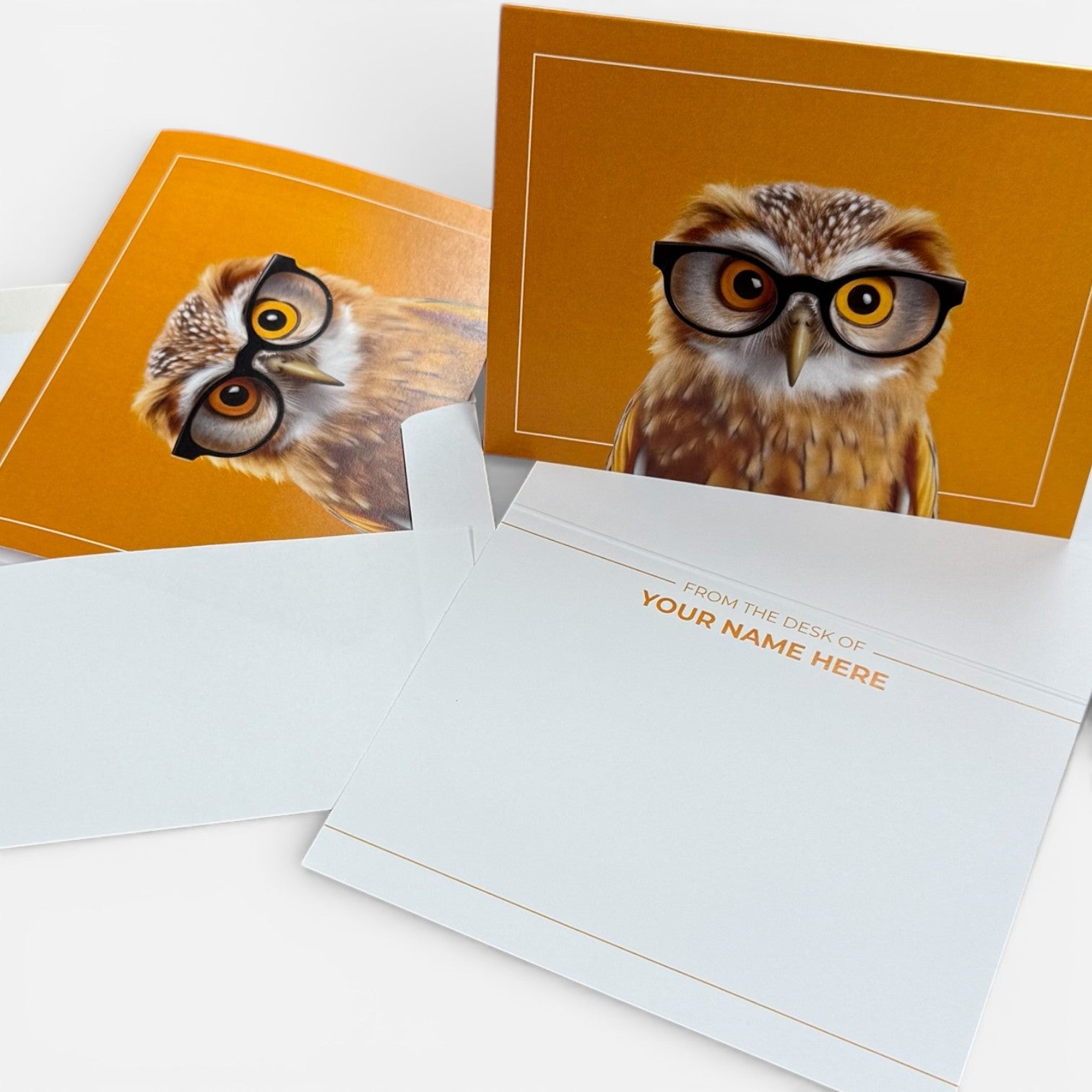 Folded A2 note card with a brown owl wearing black glasses on an orange background and customizable inside message area.