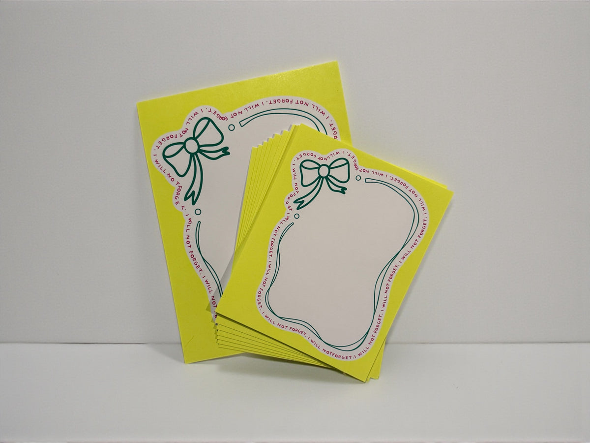 Personalized stationery set with custom yellow notepad and matching notecards decorated with green bow and scalloped border. - “I Will Not Forget” Notepad & Notecards Set