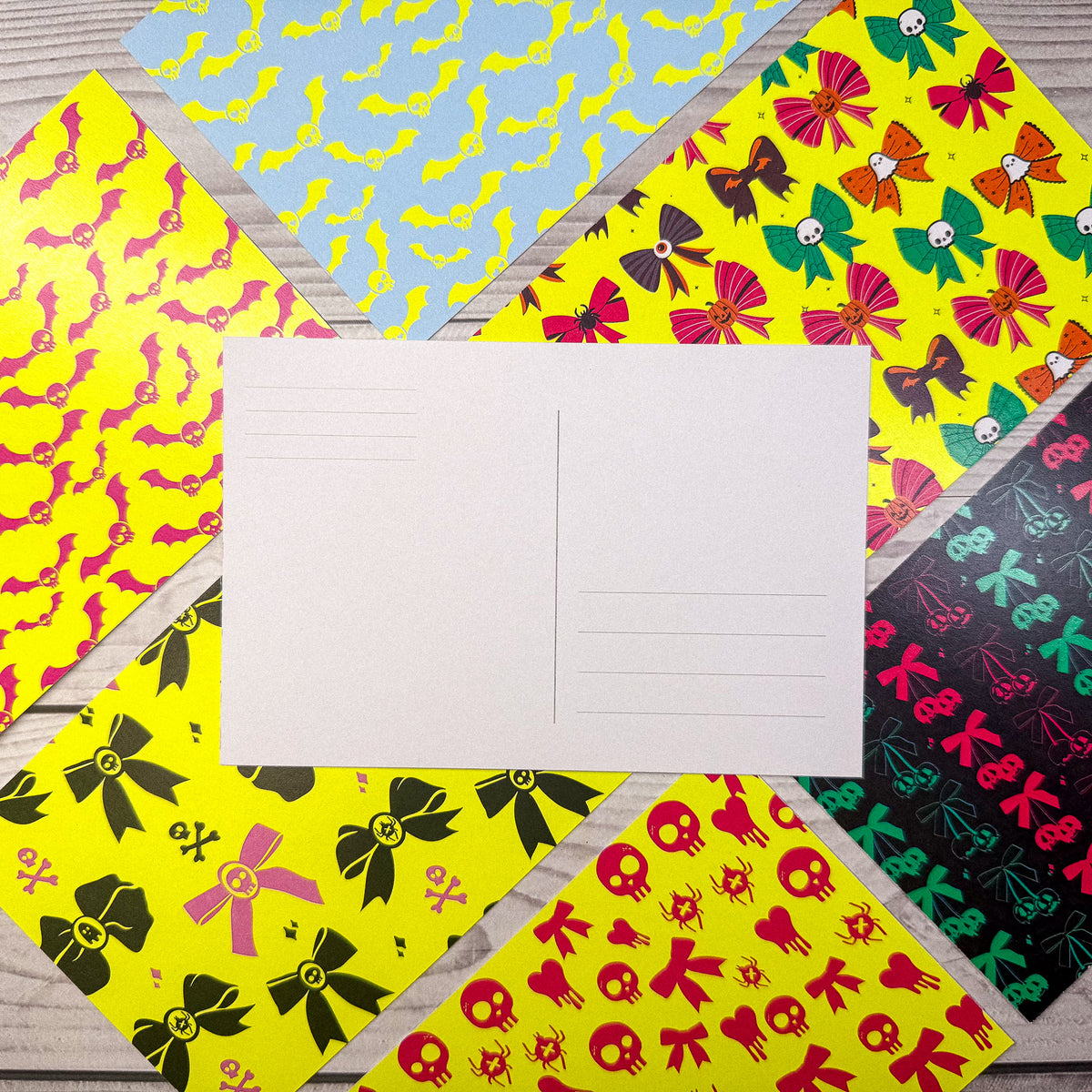 Set of colorful personalized stationery notecards with custom Halloween-themed patterns including bats, bows, skulls, and. - Neon Matching Notecards