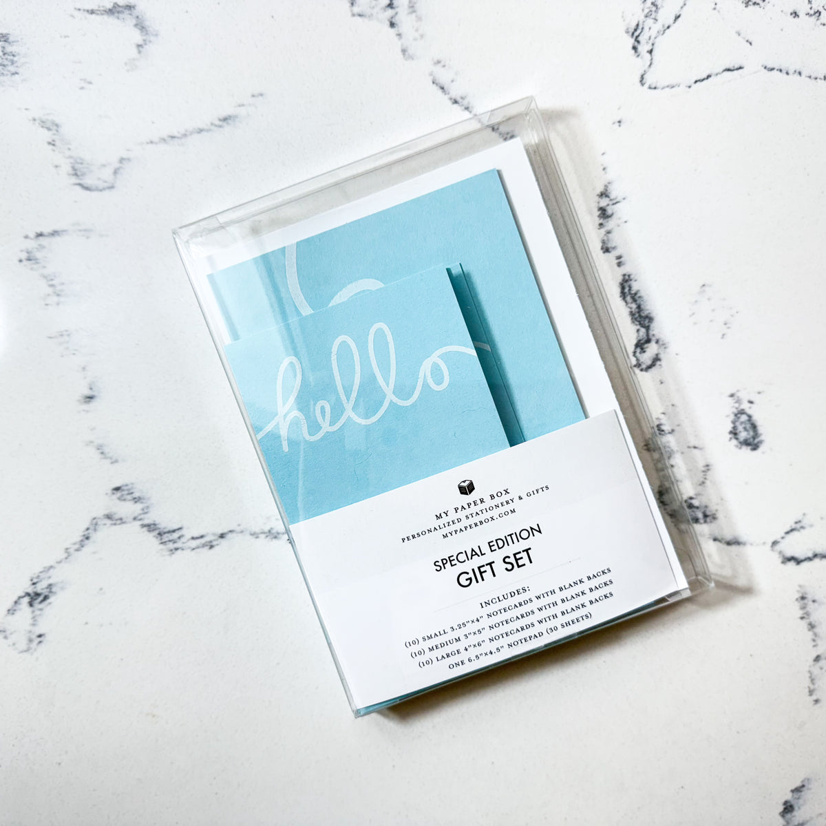 Minimal blue stationery gift set with custom notecards and personalized notepad in clear packaging. - Hello Stationery Gift Set | Minimal Blue Notecards & Notepad