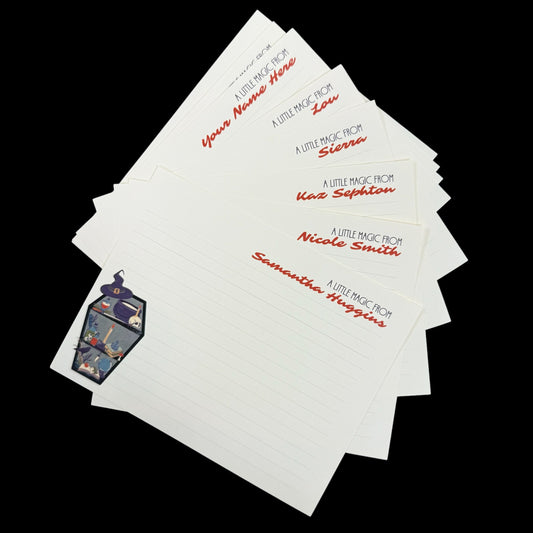 Set of 10 lined notecards with red personalized names and a small witchy coffin illustration on each card's bottom left.
